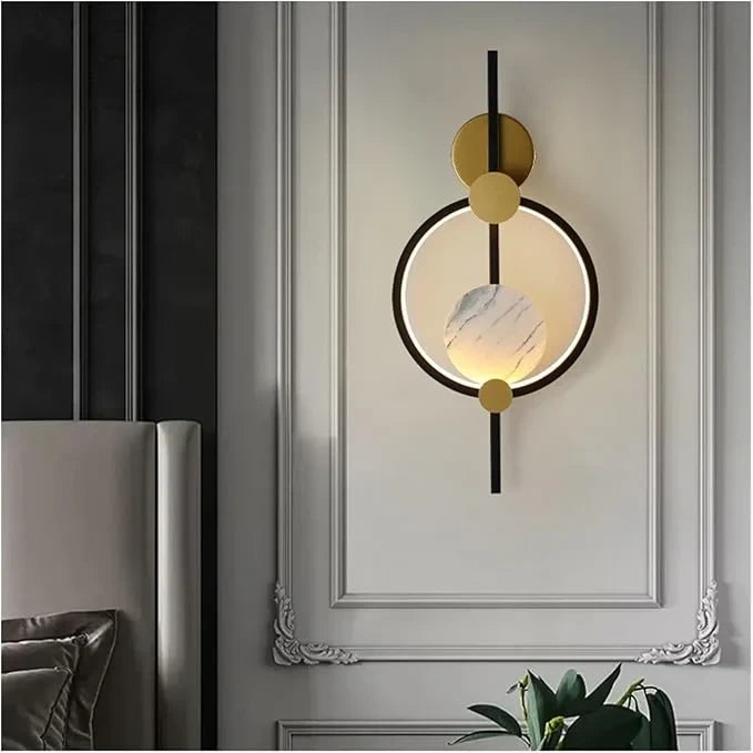 LIGHT HUB Yara & Omni modern wall lamp featuring a circular design with gold accents and a marble-effect sphere.